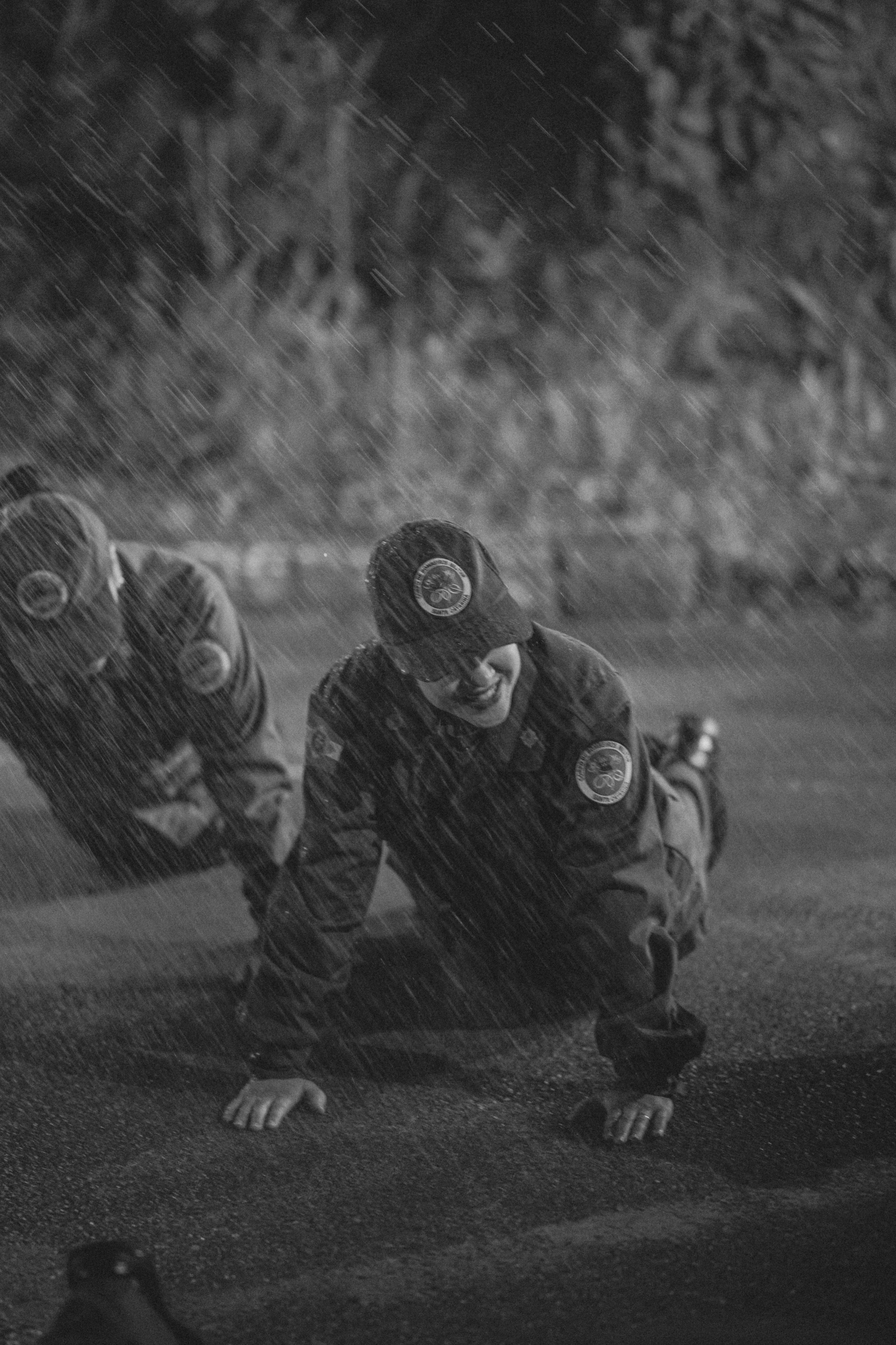 Black and white photo of soldiers training in the rain · Free Stock Photo