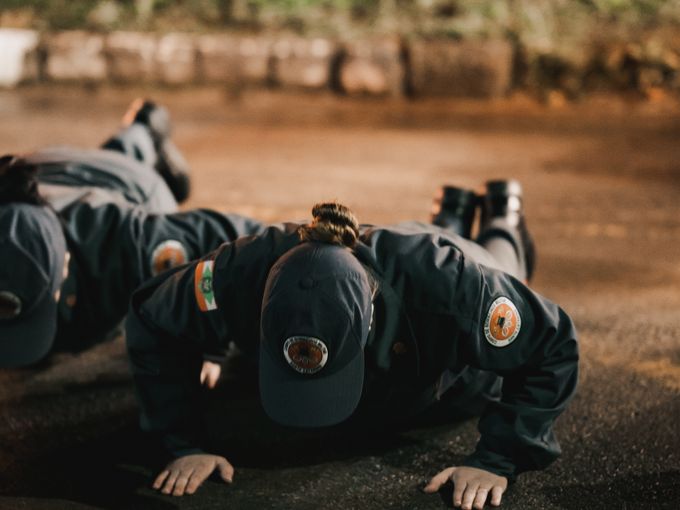 Security trainees doing physical fitness drills during training