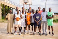 Group of Basketball Players on Outdoor Court