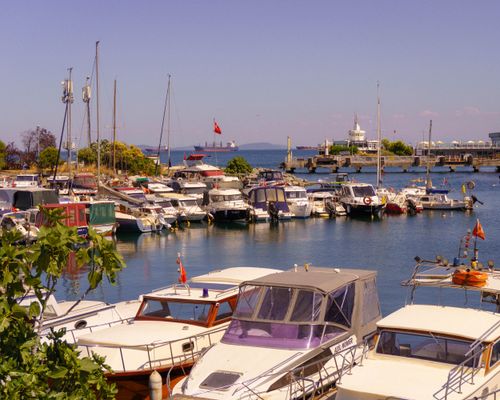 Free Discover the vibrant atmosphere of an Istanbul marina, showcasing moored boats under a clear sky. Stock Photo
