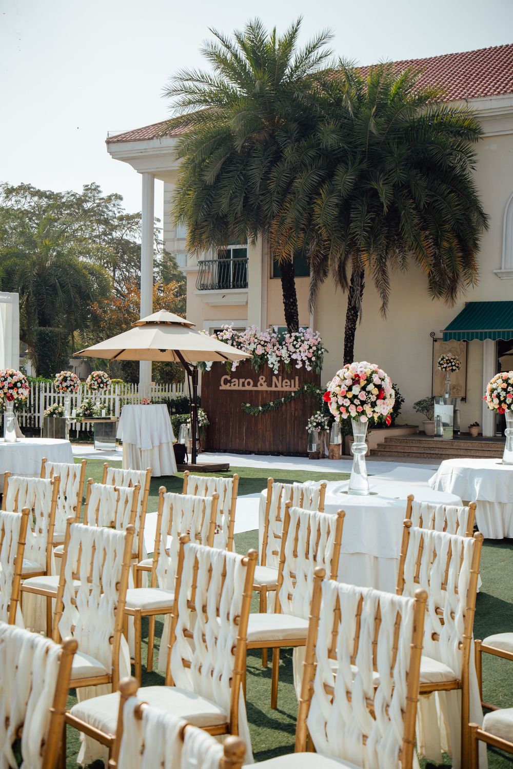 Elegant Outdoor Wedding Ceremony Setup with Chairs · Free Stock Photo