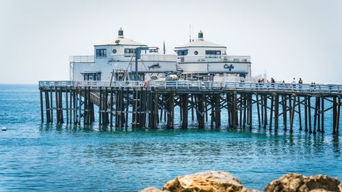 Free A picturesque view of Malibu Pier Cafe, showcasing coastal dining with ocean views. Stock Photo