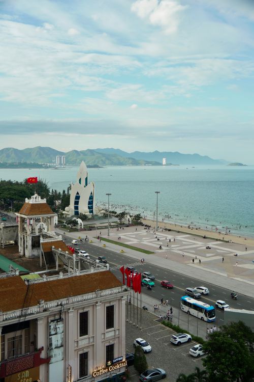 Free A stunning aerial view capturing the beachfront and iconic architecture of Nha Trang, a Vietnamese coastal city. Stock Photo