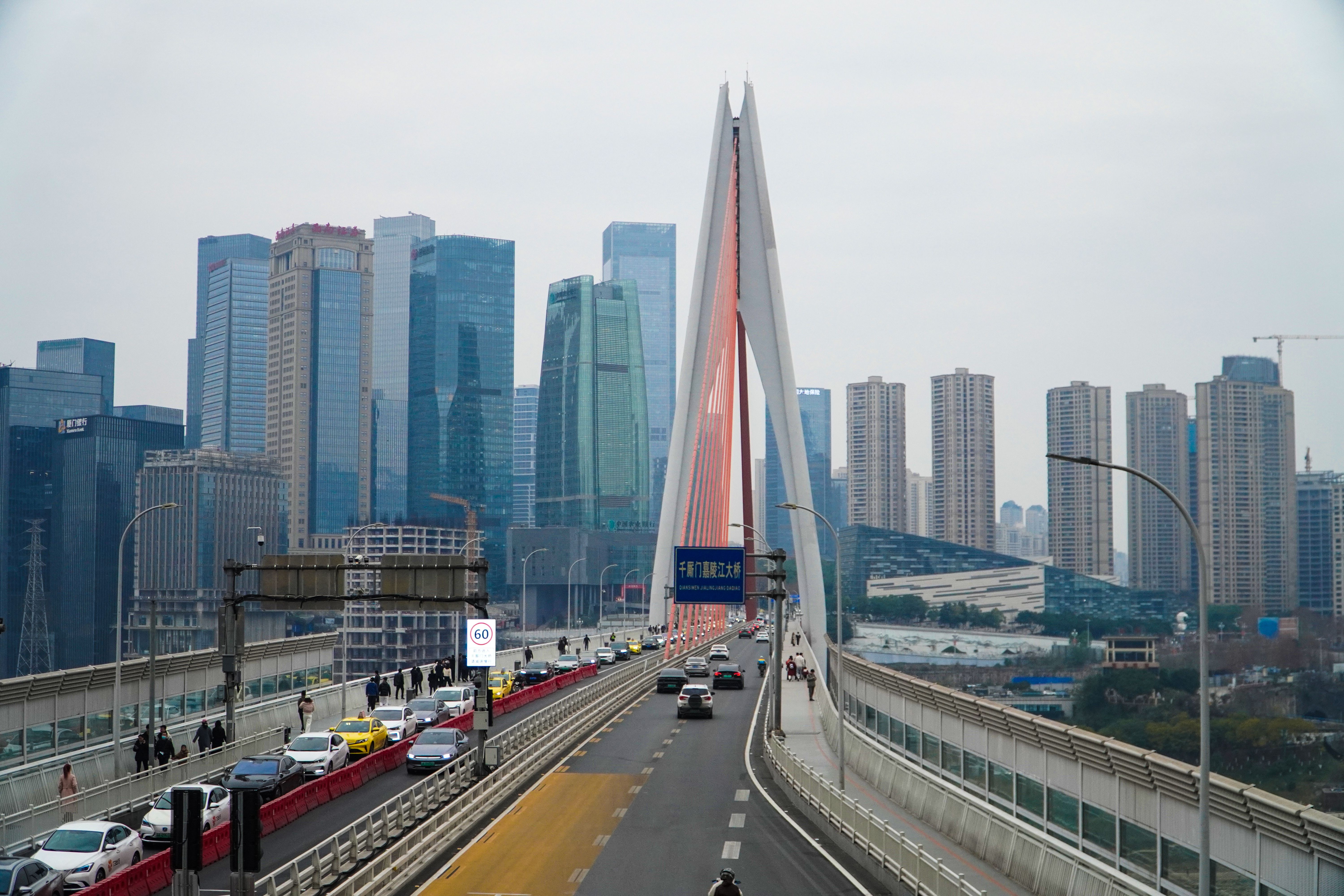 Modern Suspension Bridge in Urban Skyline · Free Stock Photo