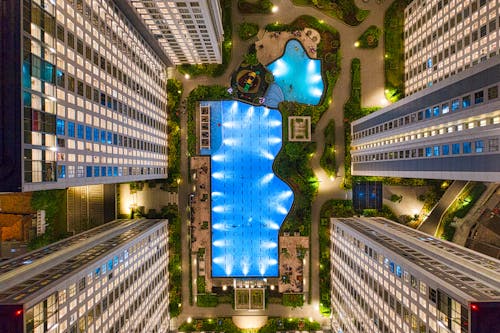 Bird's Eye View Of Hotel Buildings And A Pool