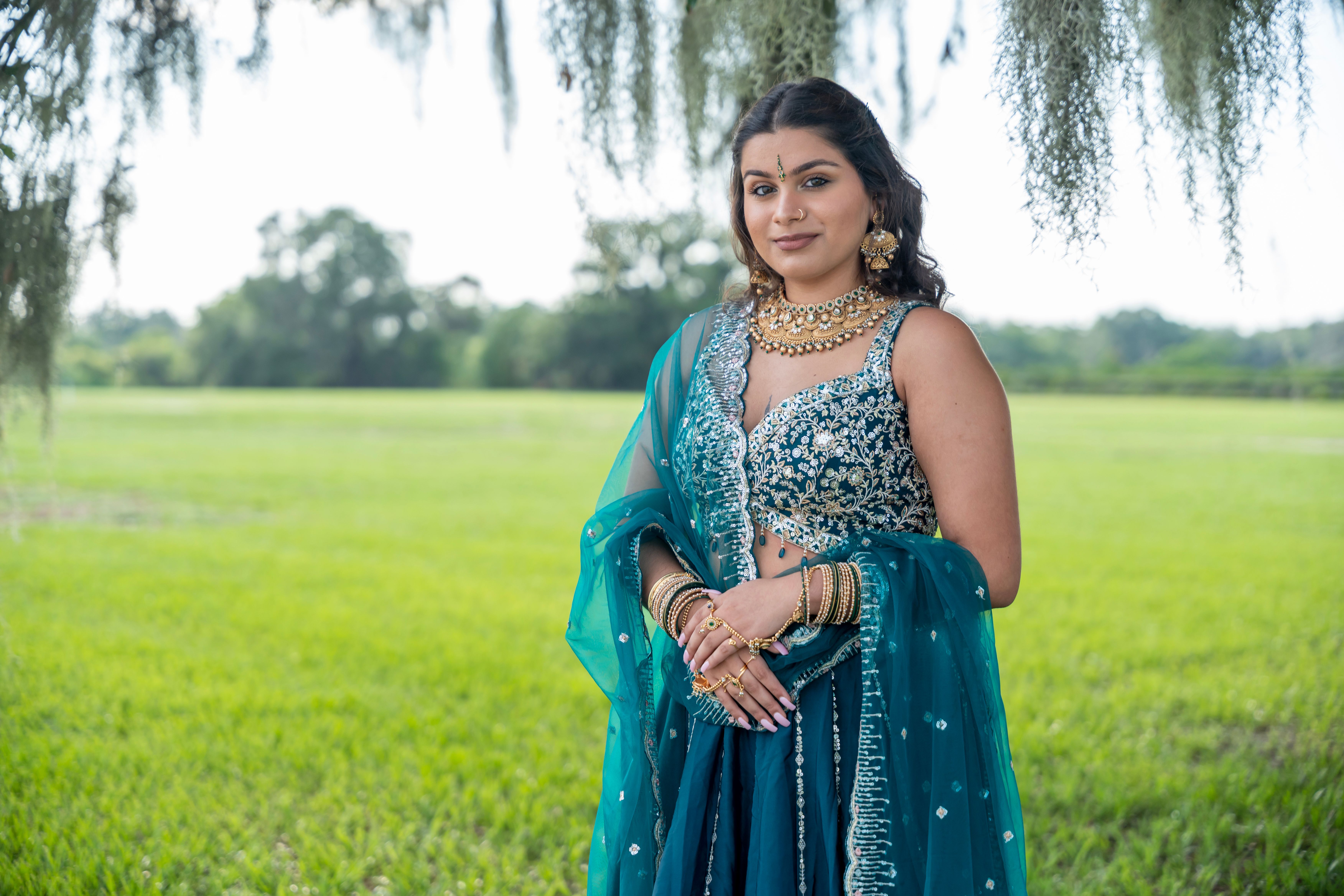Elegant Woman in Traditional Indian Attire Outdoors · Free Stock Photo