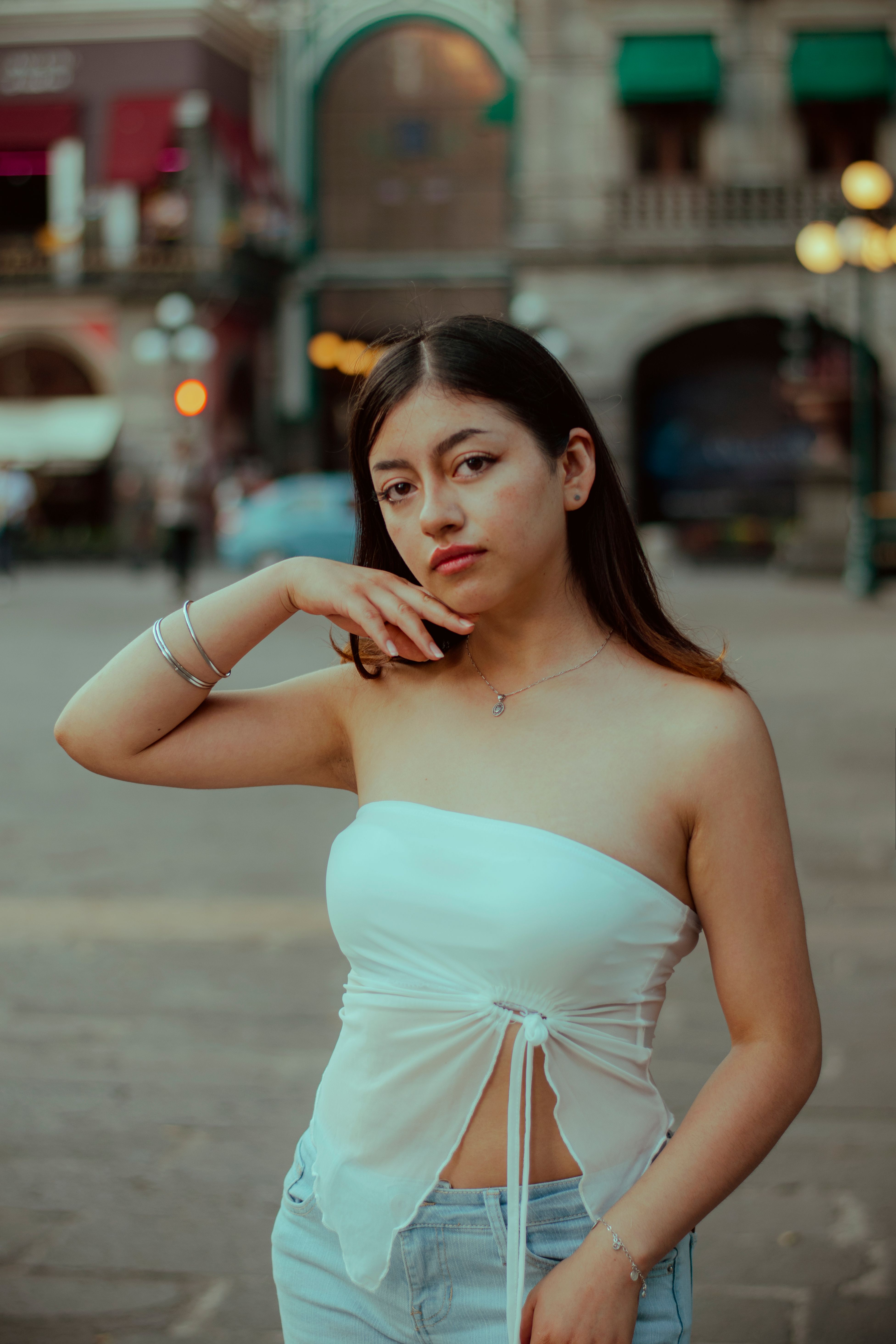 Stylish Young Woman Posing Outdoors in Summer · Free Stock Photo