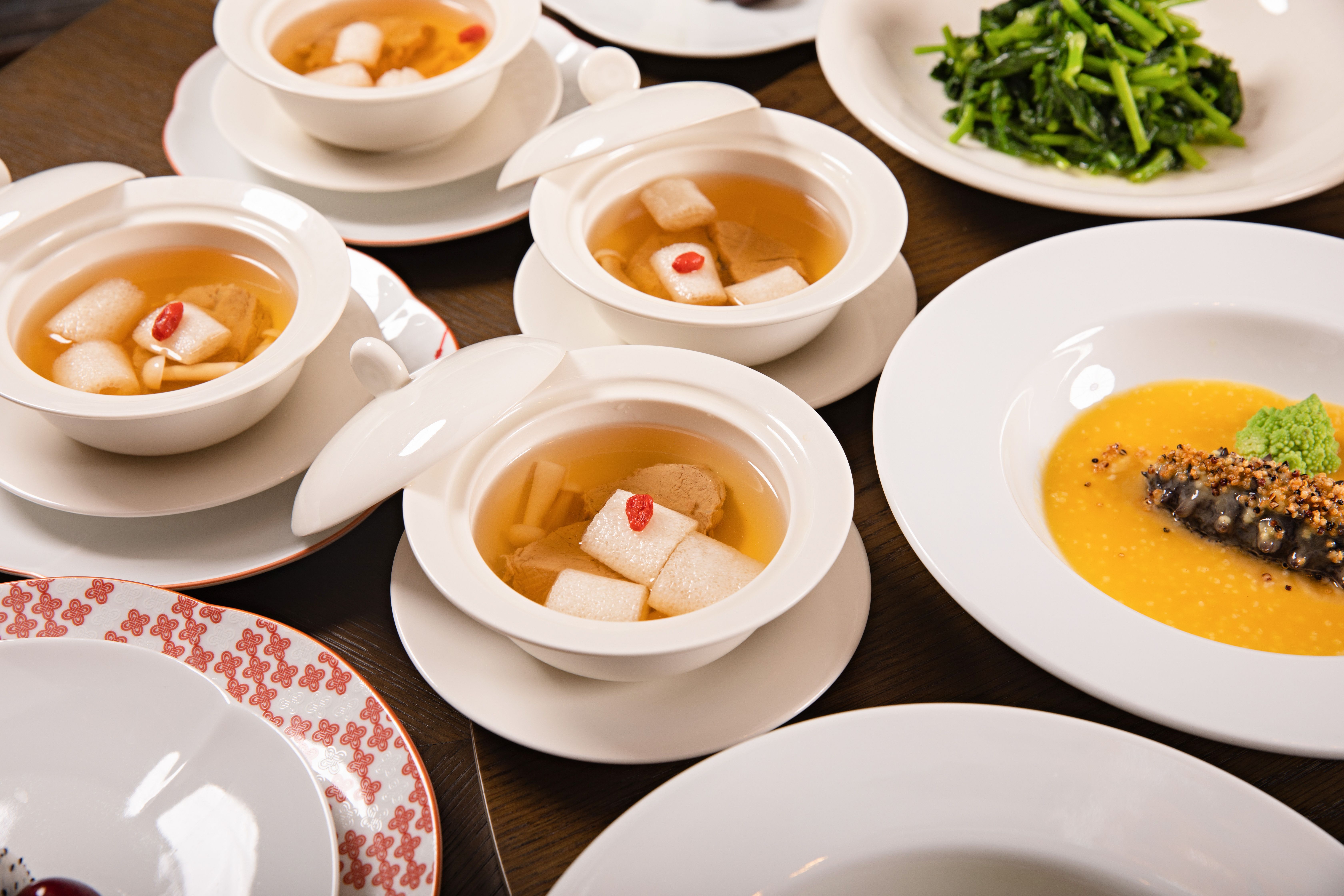 Elegant Chinese Dinner Table Setting with Soups · Free Stock Photo