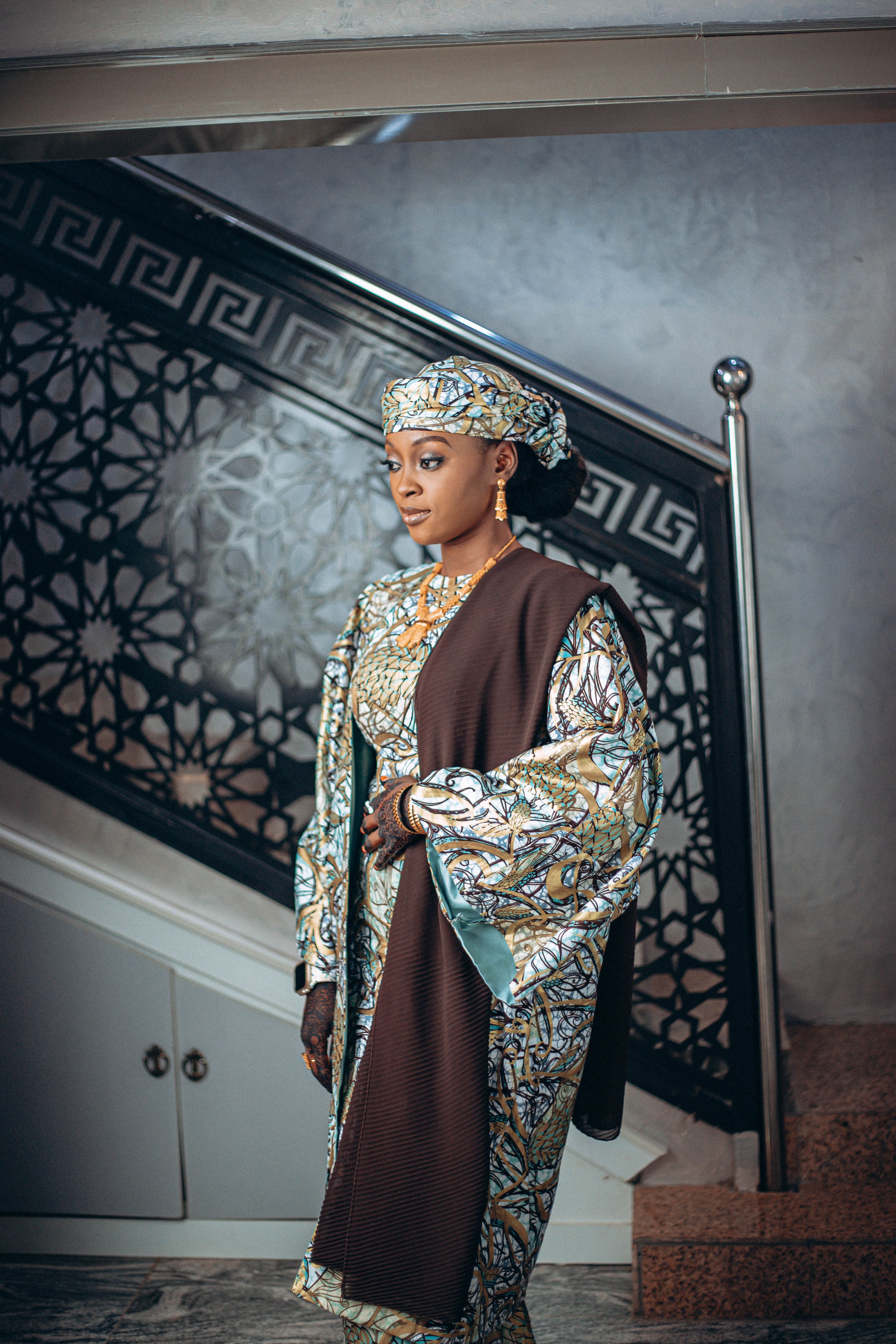 Elegant Woman in Traditional African Attire Indoors · Free Stock Photo
