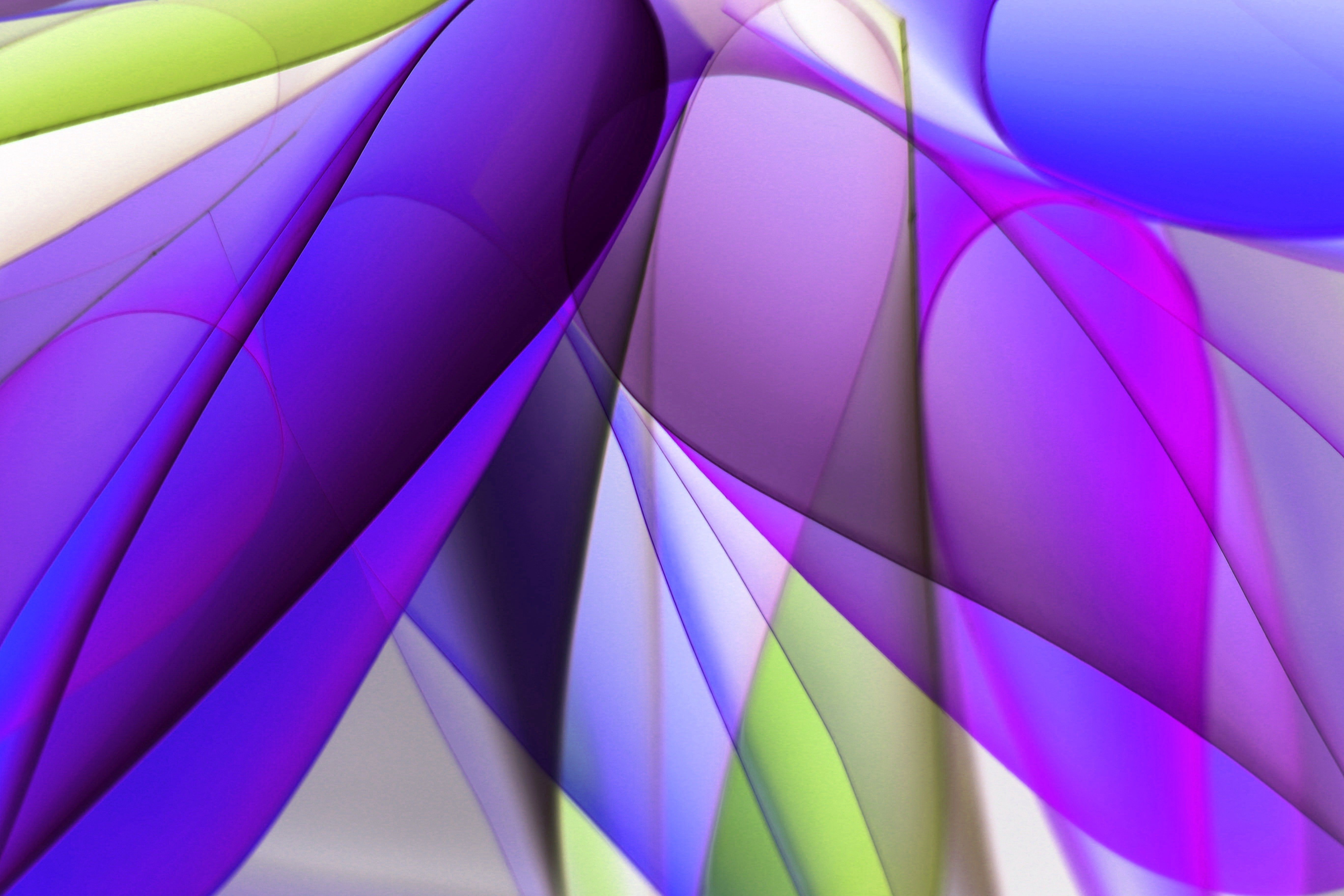 Vibrant abstract wave design with overlapping colors in purple, green, and blue tones.