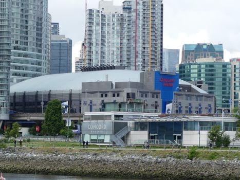 View of Vancouver's Rogers Arena with the surrounding cityscape and waterfront.