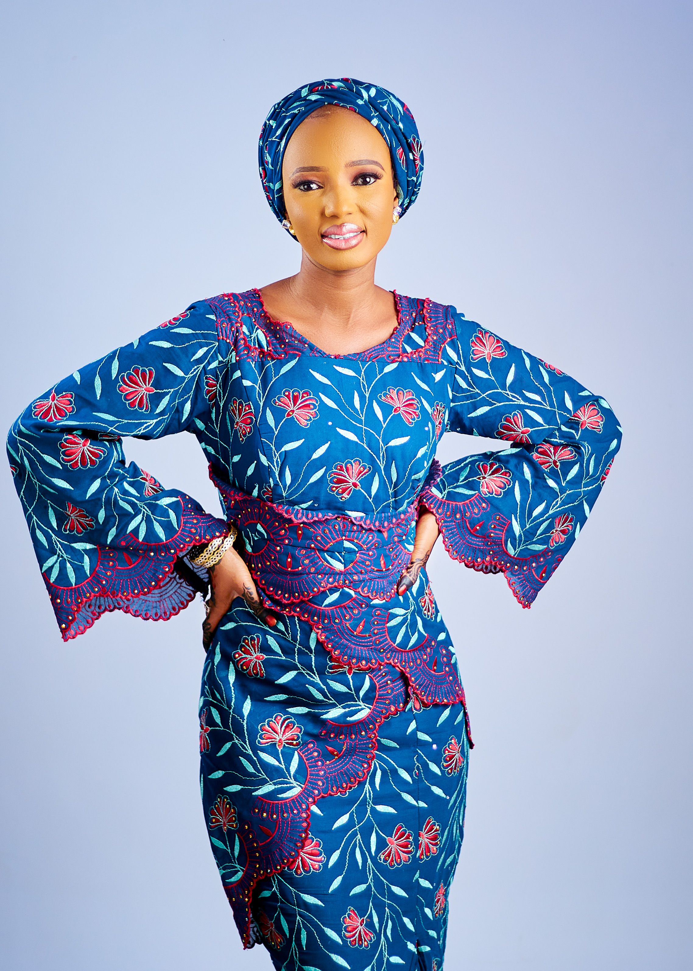 Elegant Woman in Traditional Blue Fashion Dress  Free Stock Photo