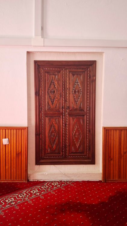 Intricate Wooden Door in Elegant Interior Setting · Free Stock Photo