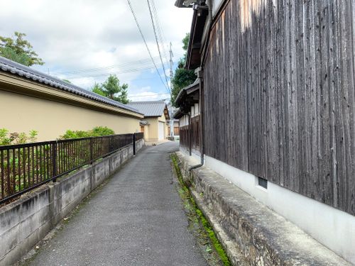 Free Charming narrow alley in Nara, Japan with traditional wooden architecture. Stock Photo