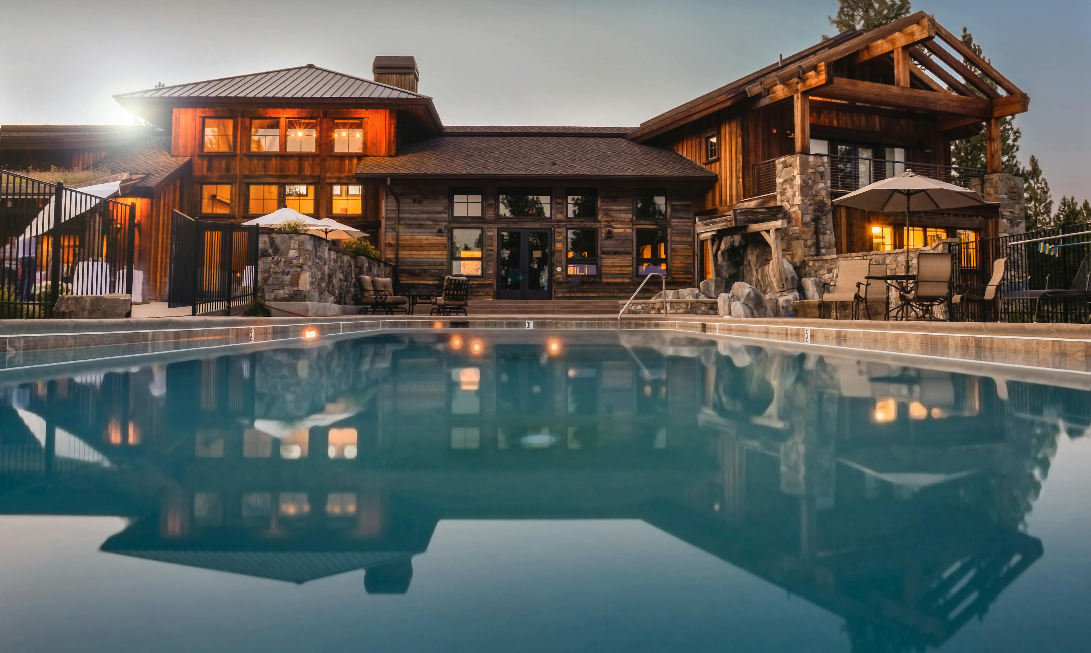 https://www.pexels.com/photo/brown-wooden-house-infront-of-swimming-pool-under-blue-sky-32870/