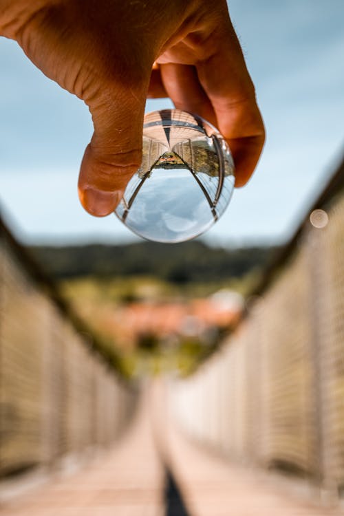 Person Holding Lensball