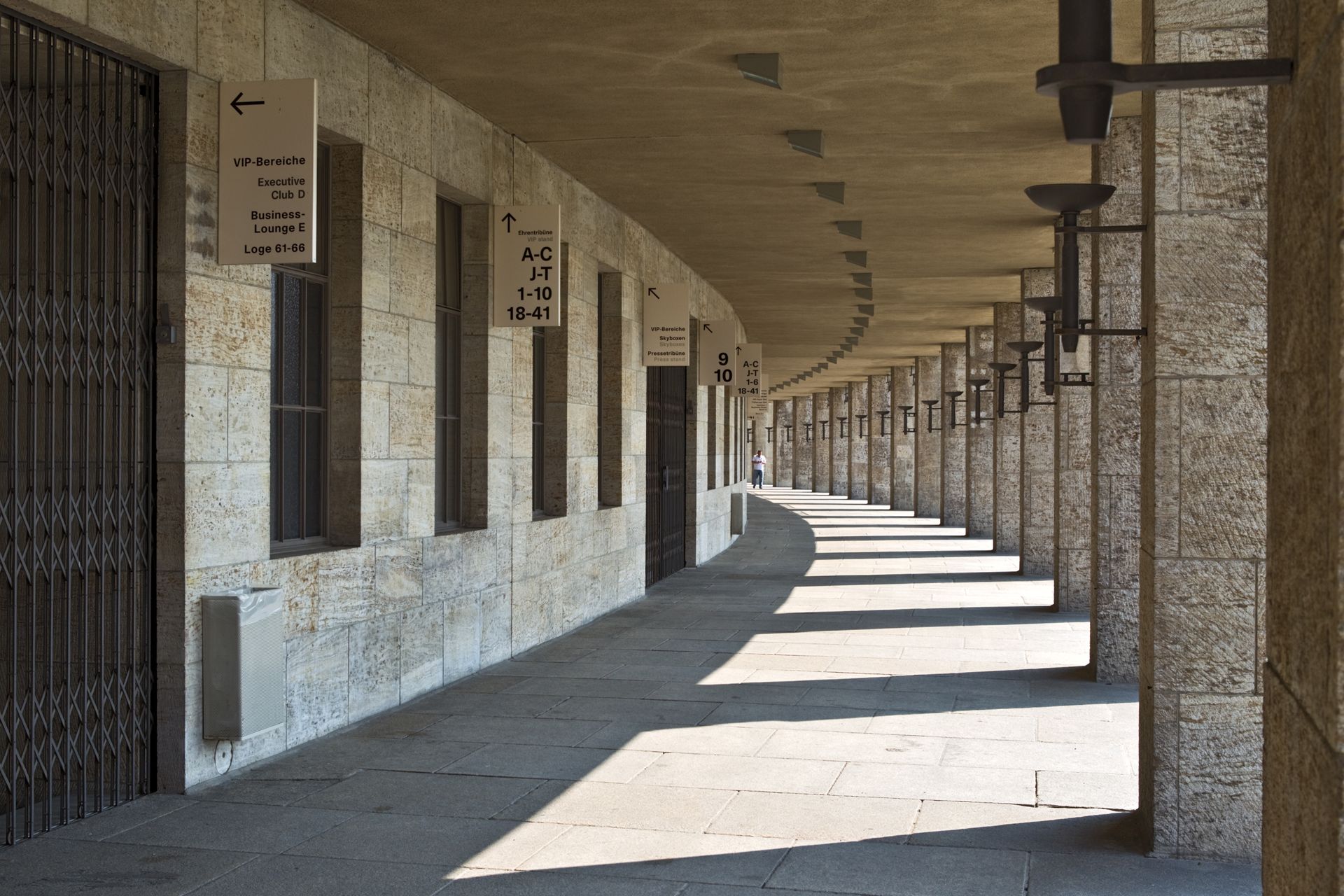 A row of stone columns creating a captivating perspective with vanishing lines.