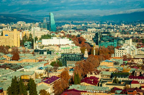 Free Captivating aerial shot of Tbilisi, Georgia, showcasing modern and historic architecture. Stock Photo