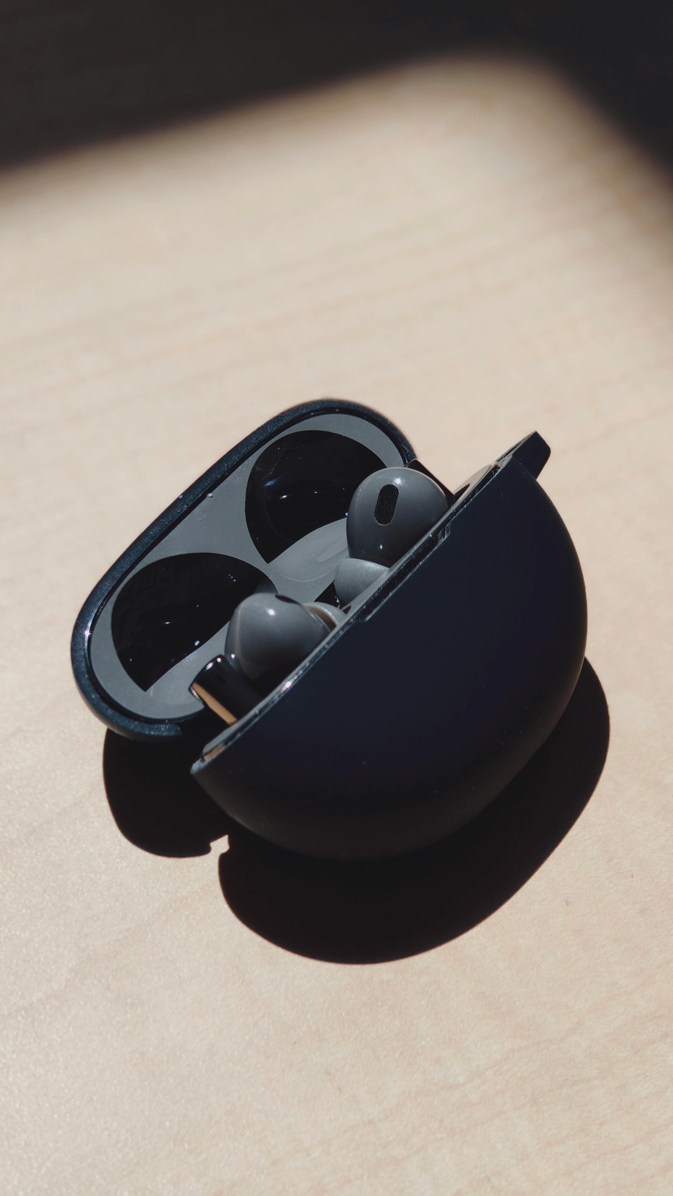 Sleek Black Wireless Earbuds in Case