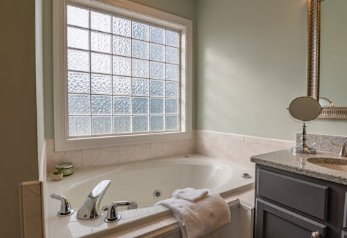 White Ceramic Bathtub Near White Ceramic Bathtub