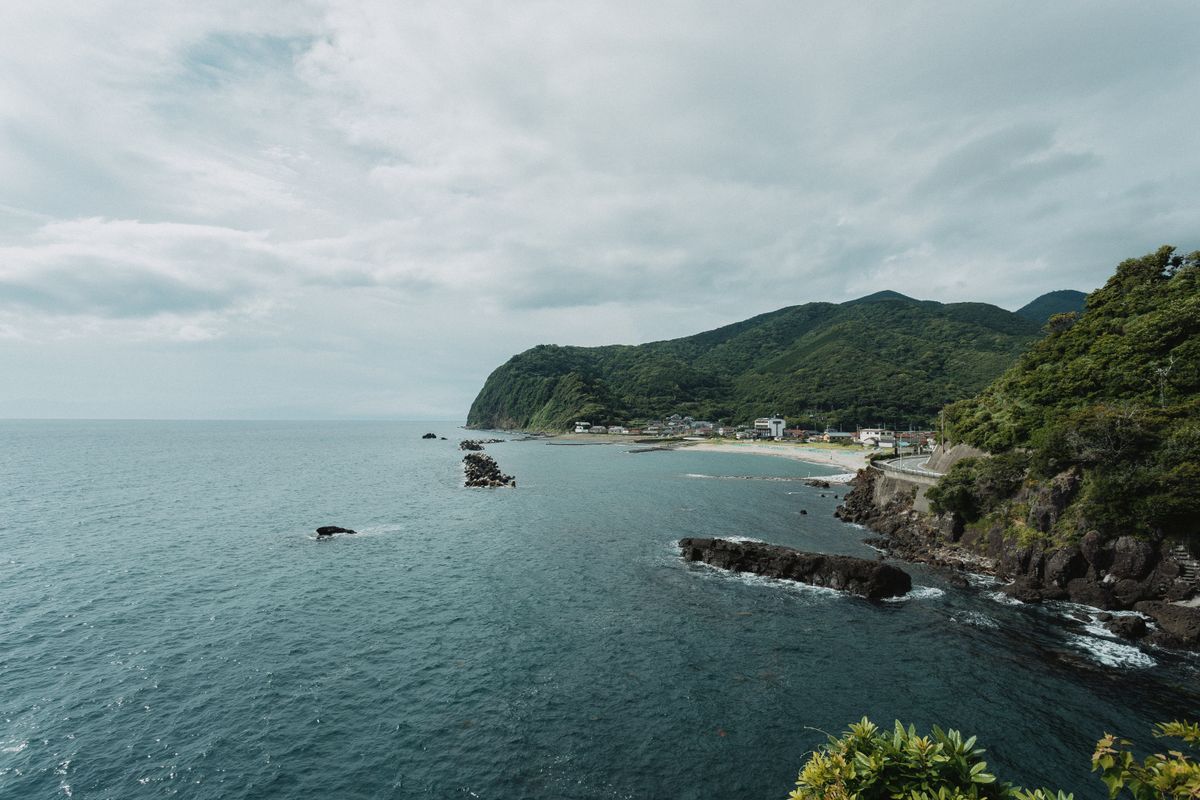 Scenic view of the West Izu coastline in Shizuoka Japan with blue ocean and rocky outcrops