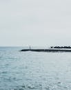 Solitary Figure on Seaside Pier in Shizuoka