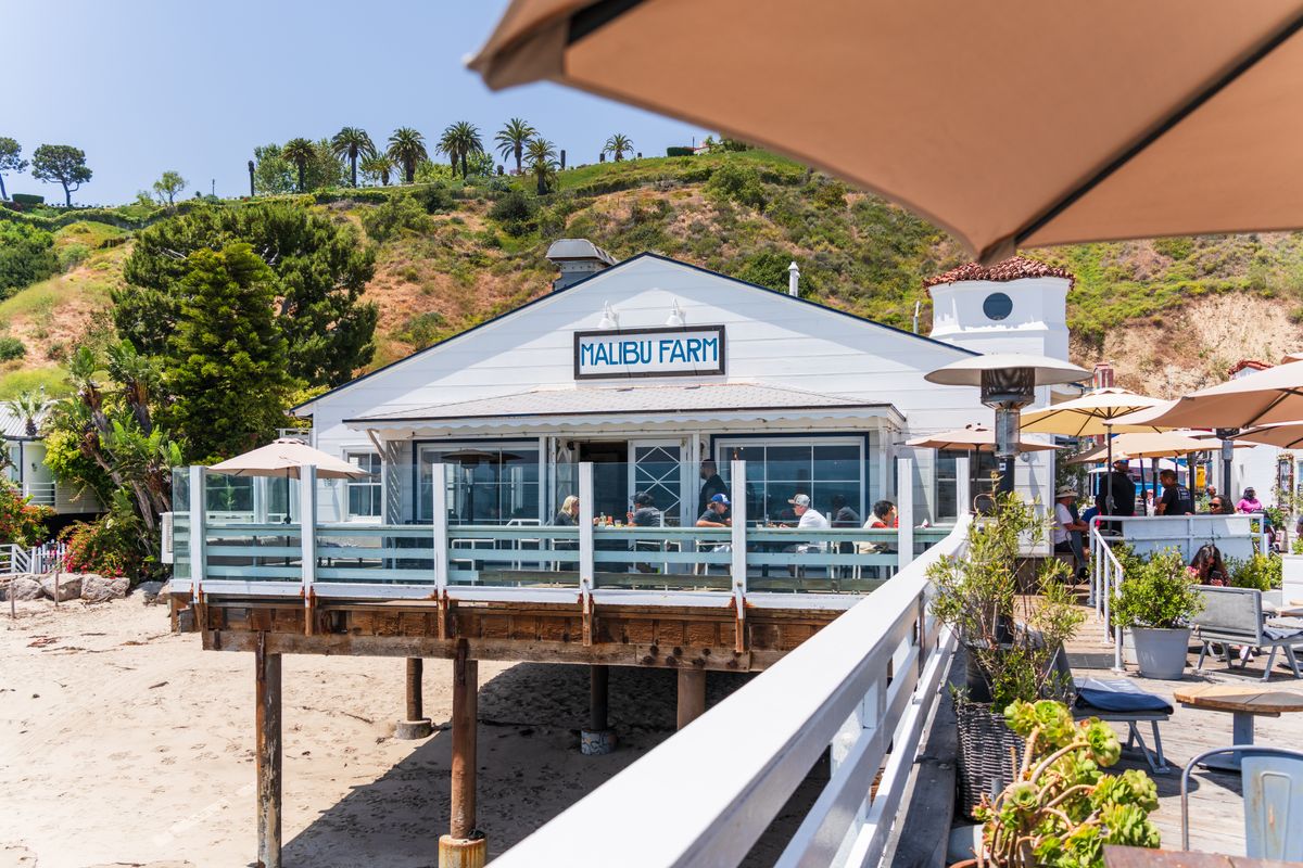 Coastal California restaurant dining patio — Malibu Farm Pier Cafe with ocean view, representative of California restaurants that use SBA financing