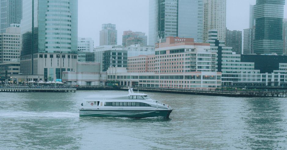 Stunning New York Harbor Brunch Cruise Review: A Luxury Weekend Experience on the Water Review 2026 - Ferry boat sailing across the Hudson River with New York City skyscrapers in the background.