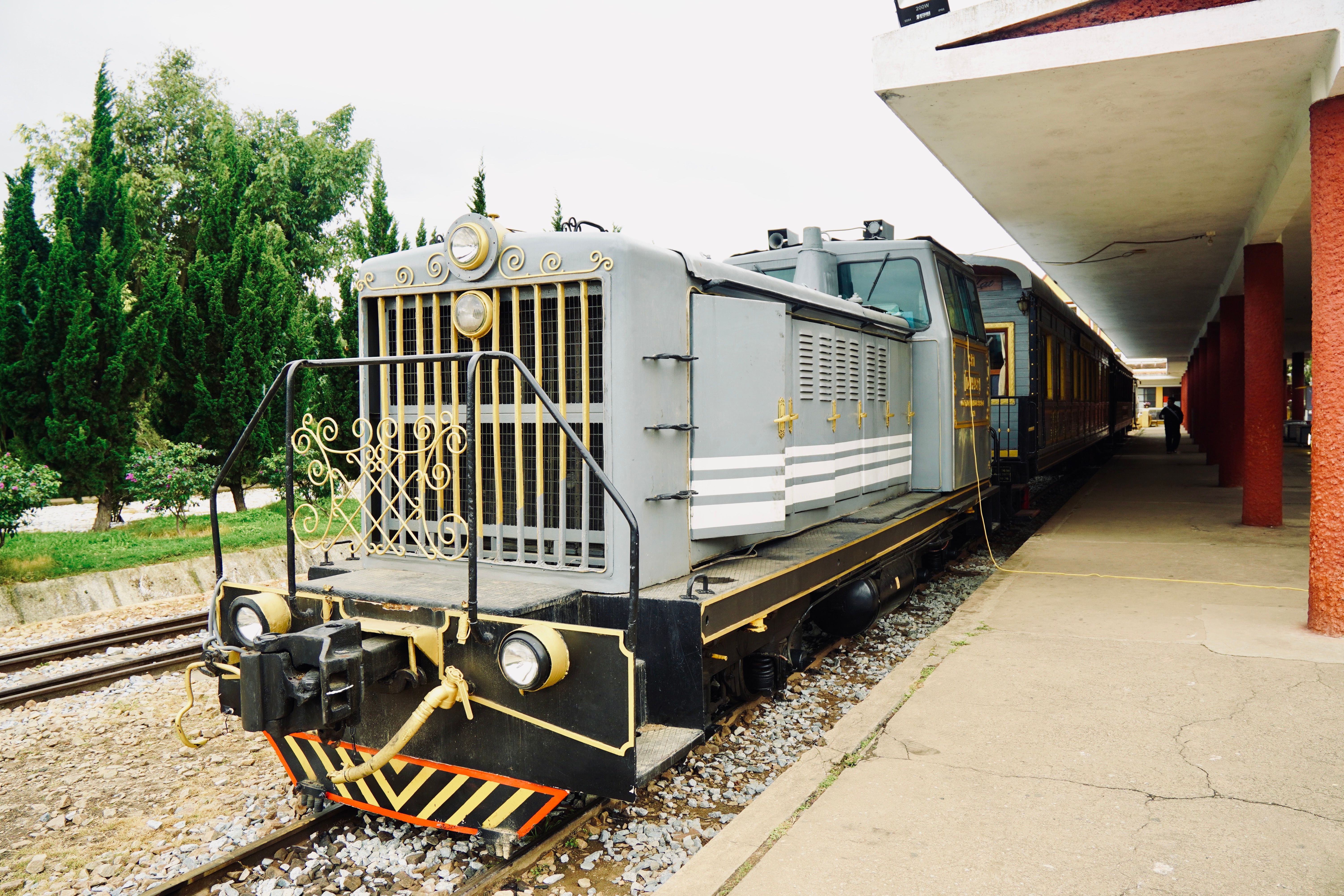 Vintage Train at an Outdoor Station · Free Stock Photo