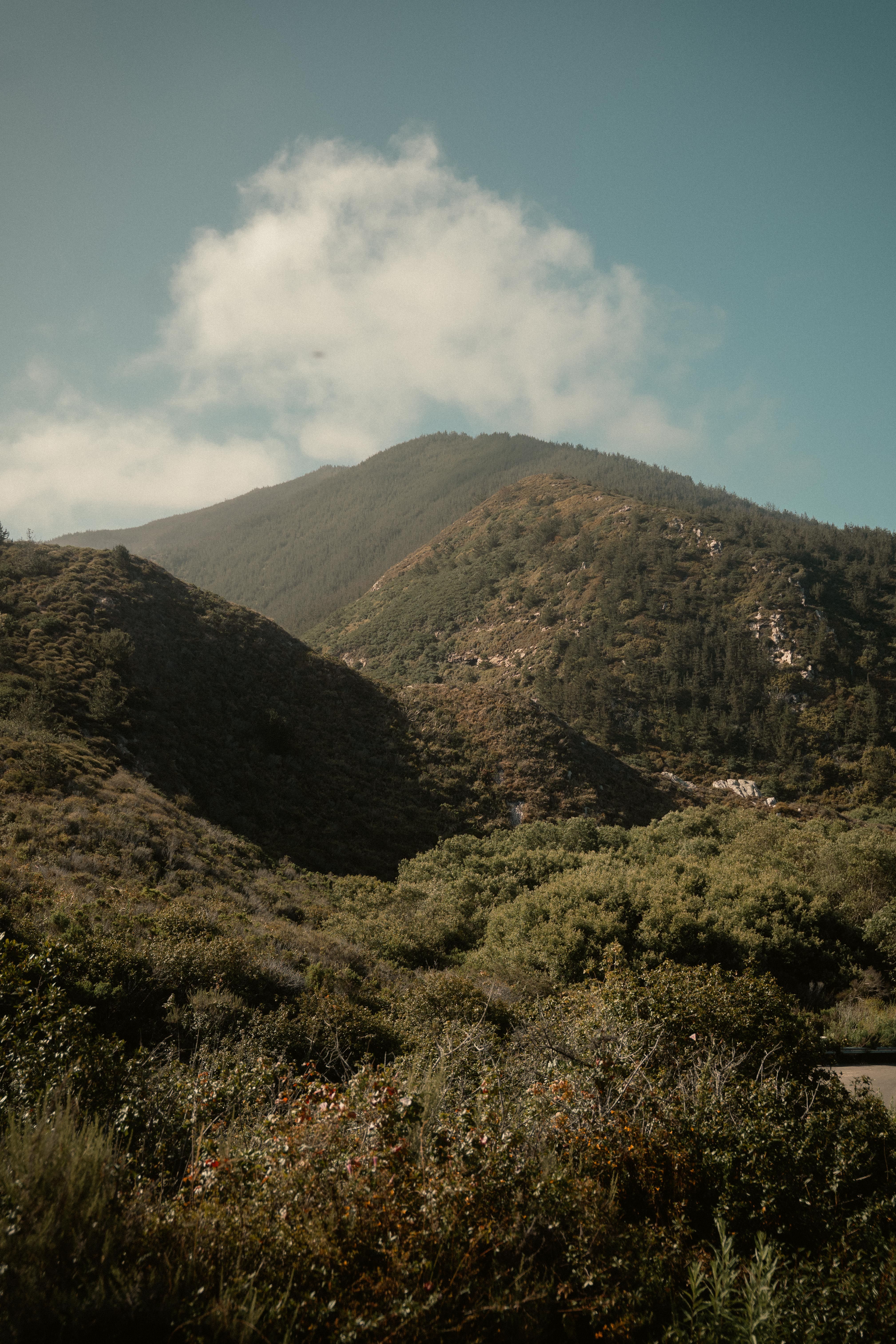 Serene Mountain Landscape Under Blue Sky · Free Stock Photo