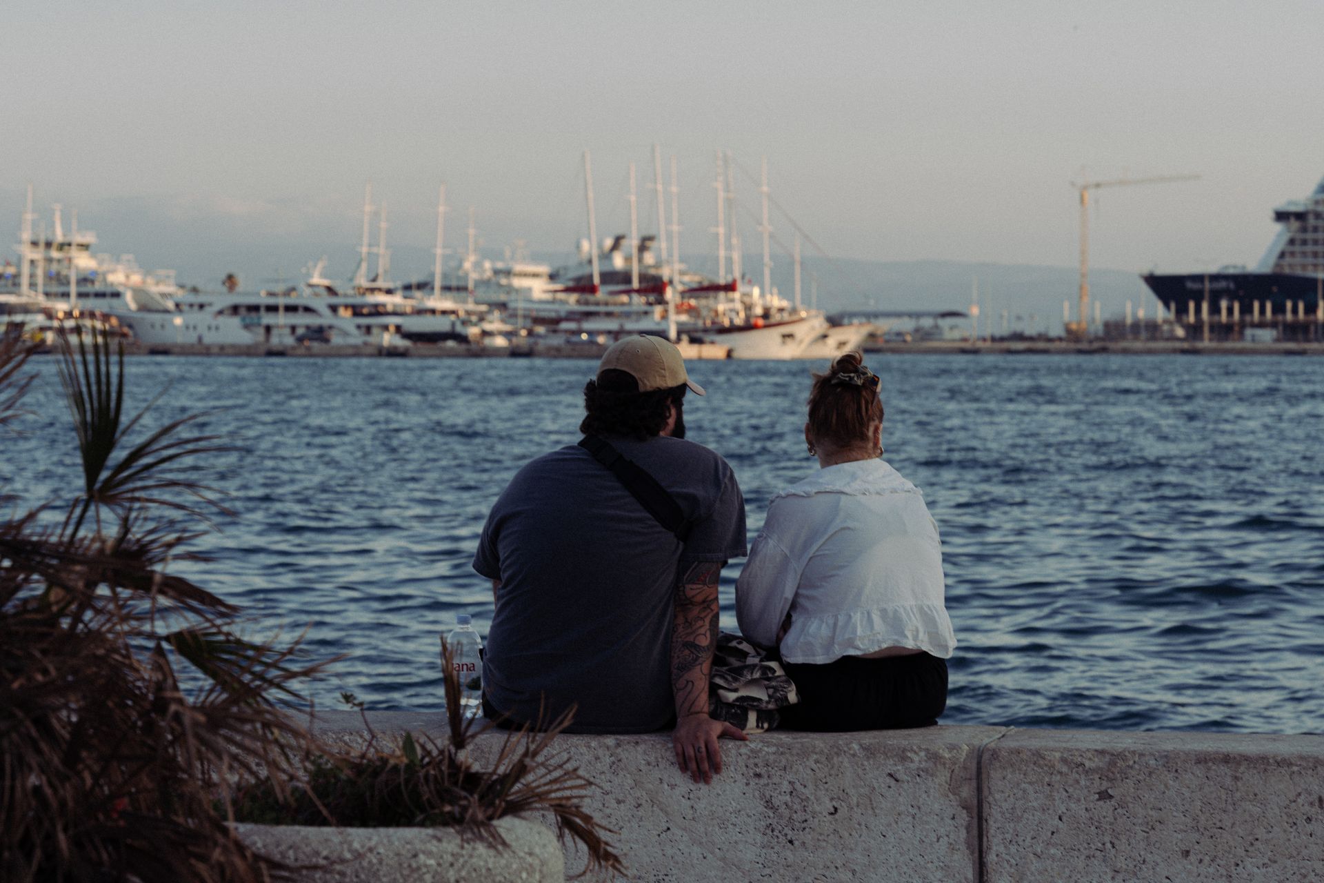 A couple enjoys a peaceful evening overlooking the marina at Split, Croatia.