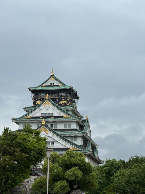 Free Stunning view of the historic Osaka Castle against a cloudy sky in Osaka, Japan. Stock Photo
