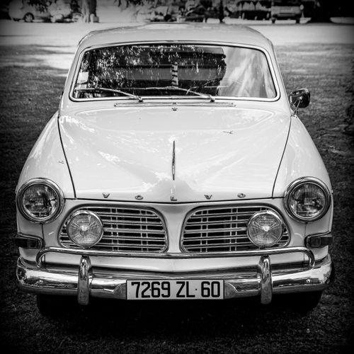 Free Front view of a classic Volvo car captured in black and white, showcasing its vintage design. Stock Photo