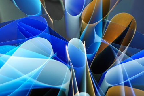 Free Vibrant abstract composition of colorful rolled paper creating a dynamic visual effect. Stock Photo
