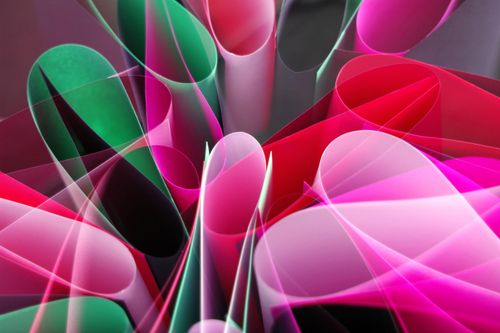 Free Abstract design with colorful rolled paper forms creating a dynamic pattern. Stock Photo