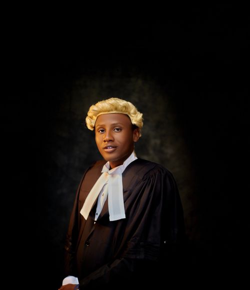 Free Portrait of a young professional in legal attire with a classic look. Stock Photo