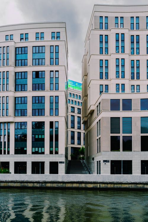 Free Stylish modern architecture with glass facades by a river in Minsk, Belarus. Stock Photo