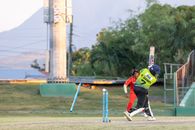 Exciting capture of a cricket match with players in action in Basseterre, Saint Kitts and Nevis.