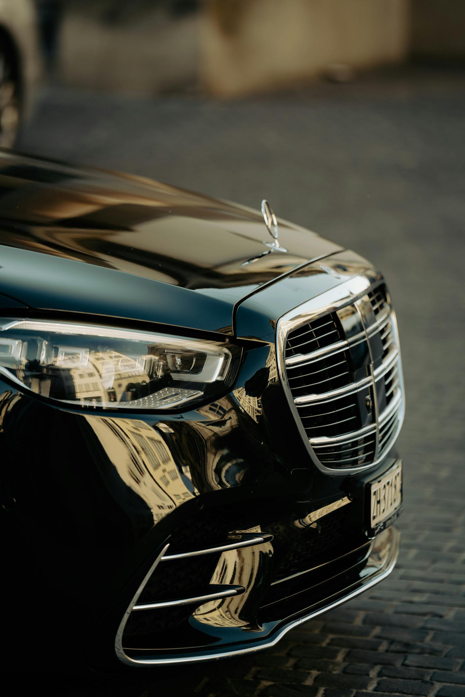 Black luxury saloon — representative imagery (Pexels)