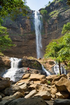 Breathtaking view of a waterfall in Ciletuh Geopark, perfect for nature explorers.