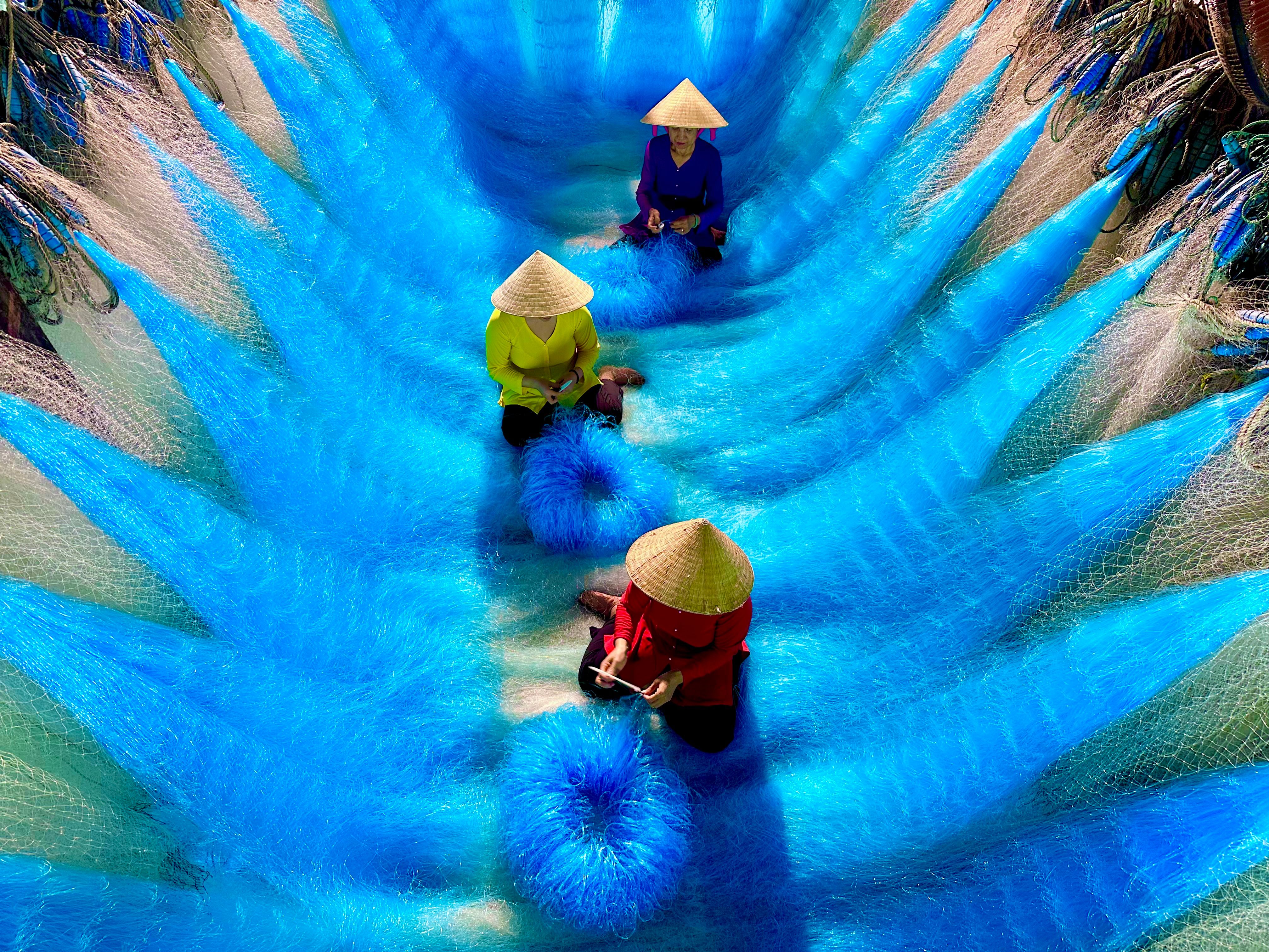 Colorful Traditional Fishing Nets Process in Asia · Free Stock Photo