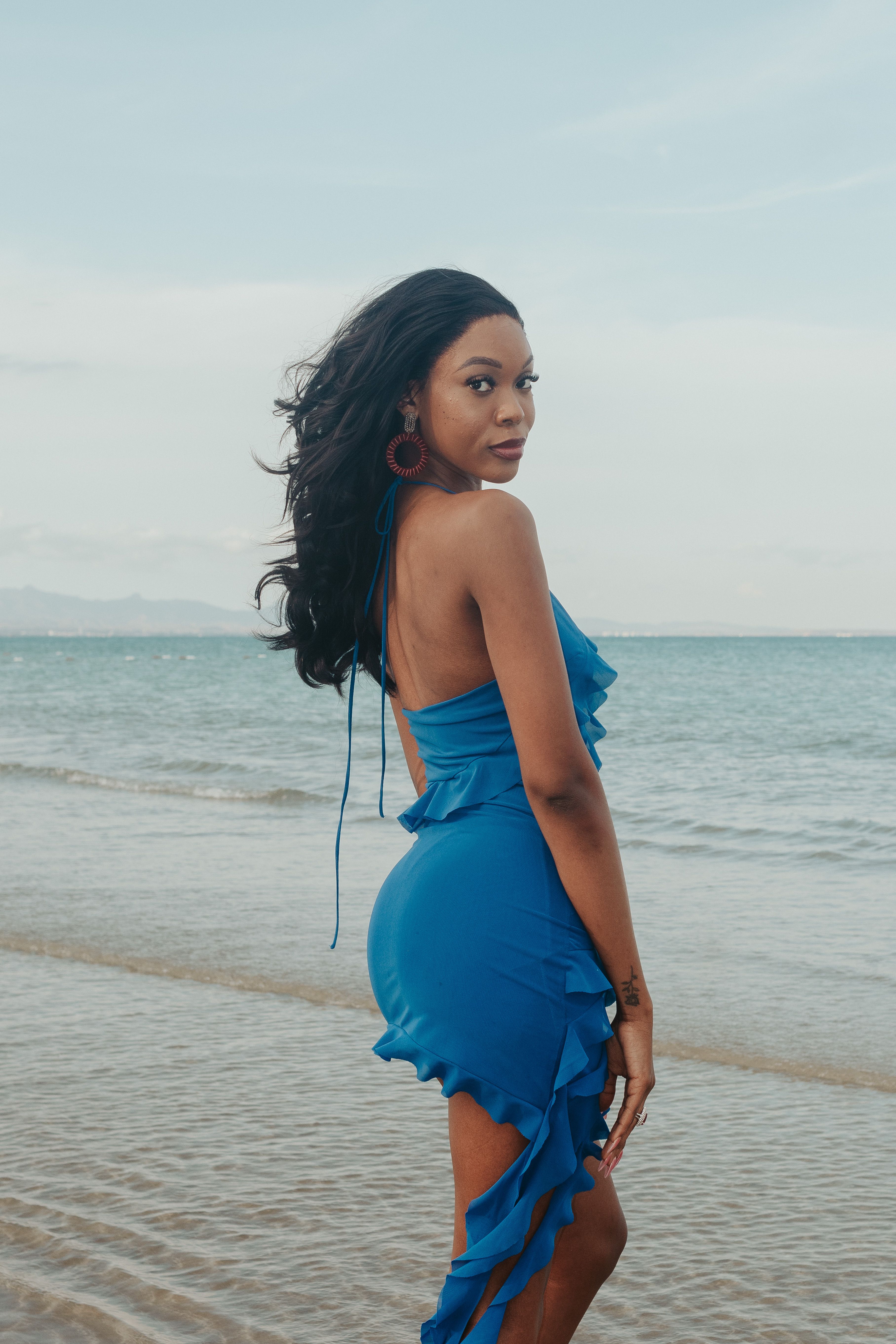 Elegant Woman in Blue Dress on Yeni skele Beach  Free Stock Photo
