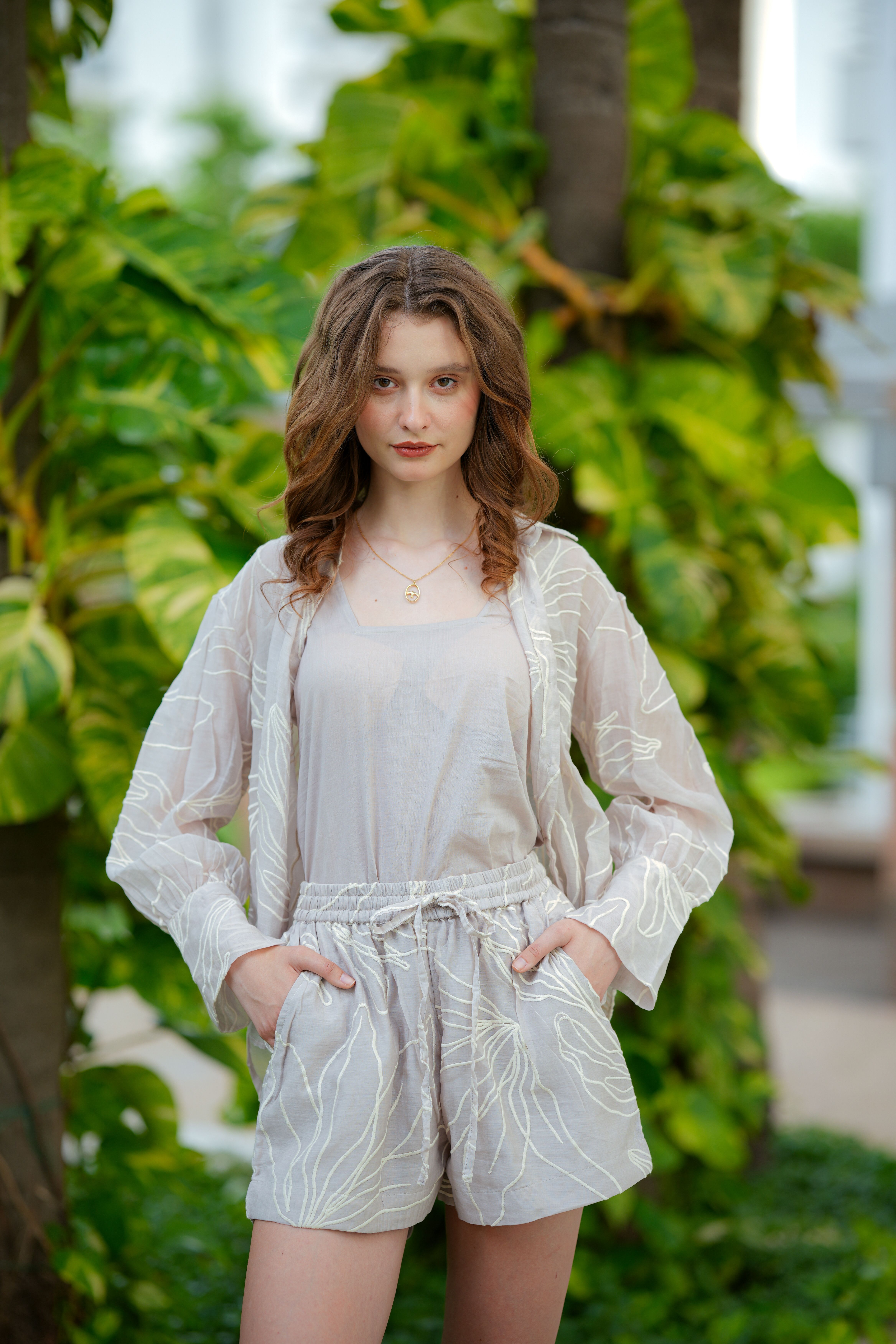 Fashionable Woman Posing Outdoors in Stylish Outfit · Free Stock Photo