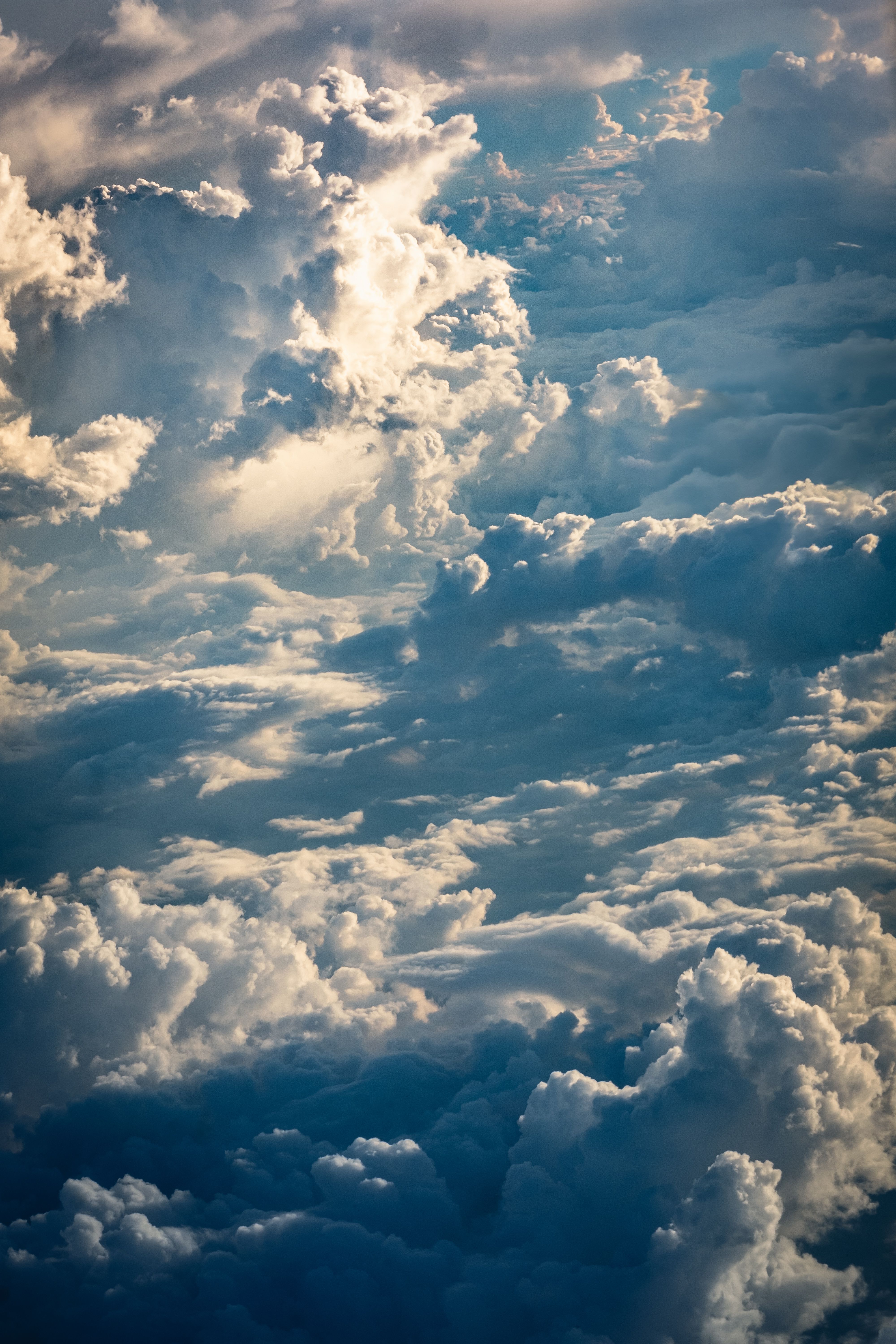 Dramatic Aerial View of Fluffy Cumulus Clouds · Free Stock Photo