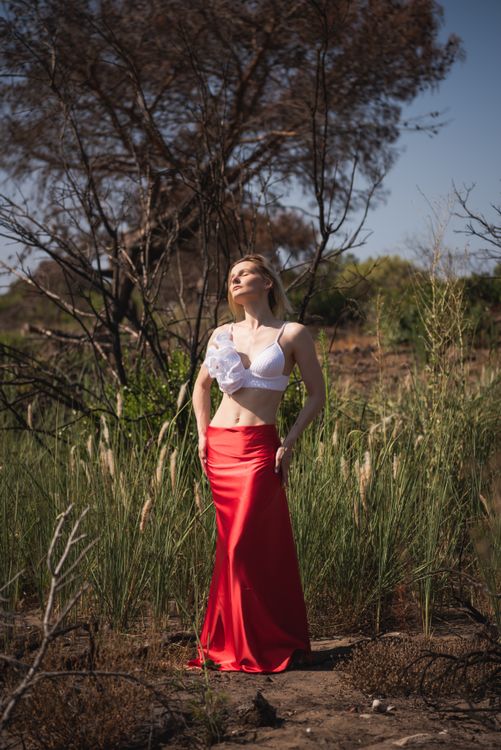 Stylish Woman Posing Outdoors in Summer · Free Stock Photo