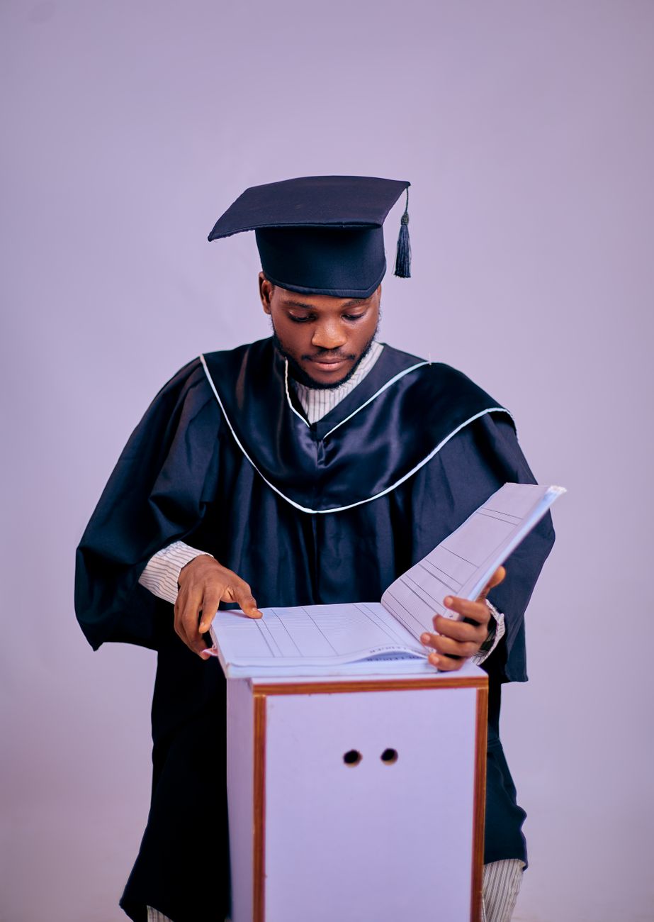Graduate reviewing documents as repayment options narrow before the first loan bill arrives