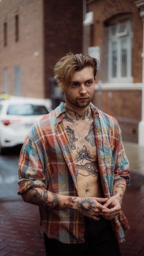 Man Wearing Brown and Blue Plaid Dress Shirt