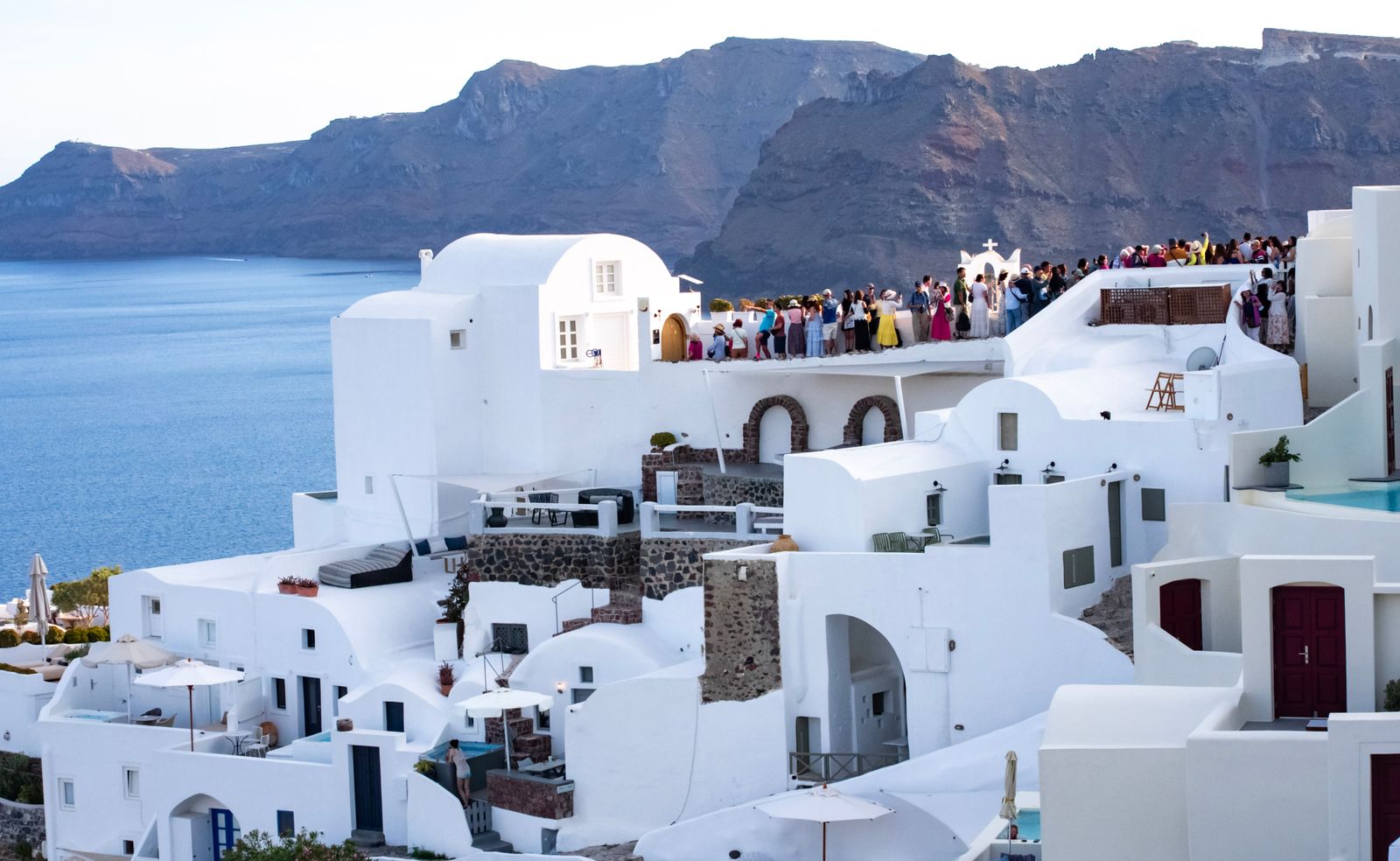 Whitewashed cliffside buildings of Fira, Santorini, overlooking the Aegean Sea