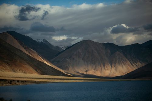 Free Breathtaking view of Pangong Lake with mountains and dynamic clouds in Ladakh, India. Stock Photo
