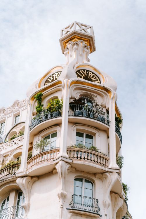 Free Stunning Art Nouveau building facade in Paris, showcasing intricate design details. Stock Photo
